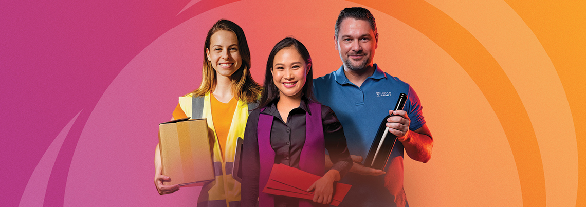 Group of Manitoba Liquor and Lotteries employees in front of a colourful background